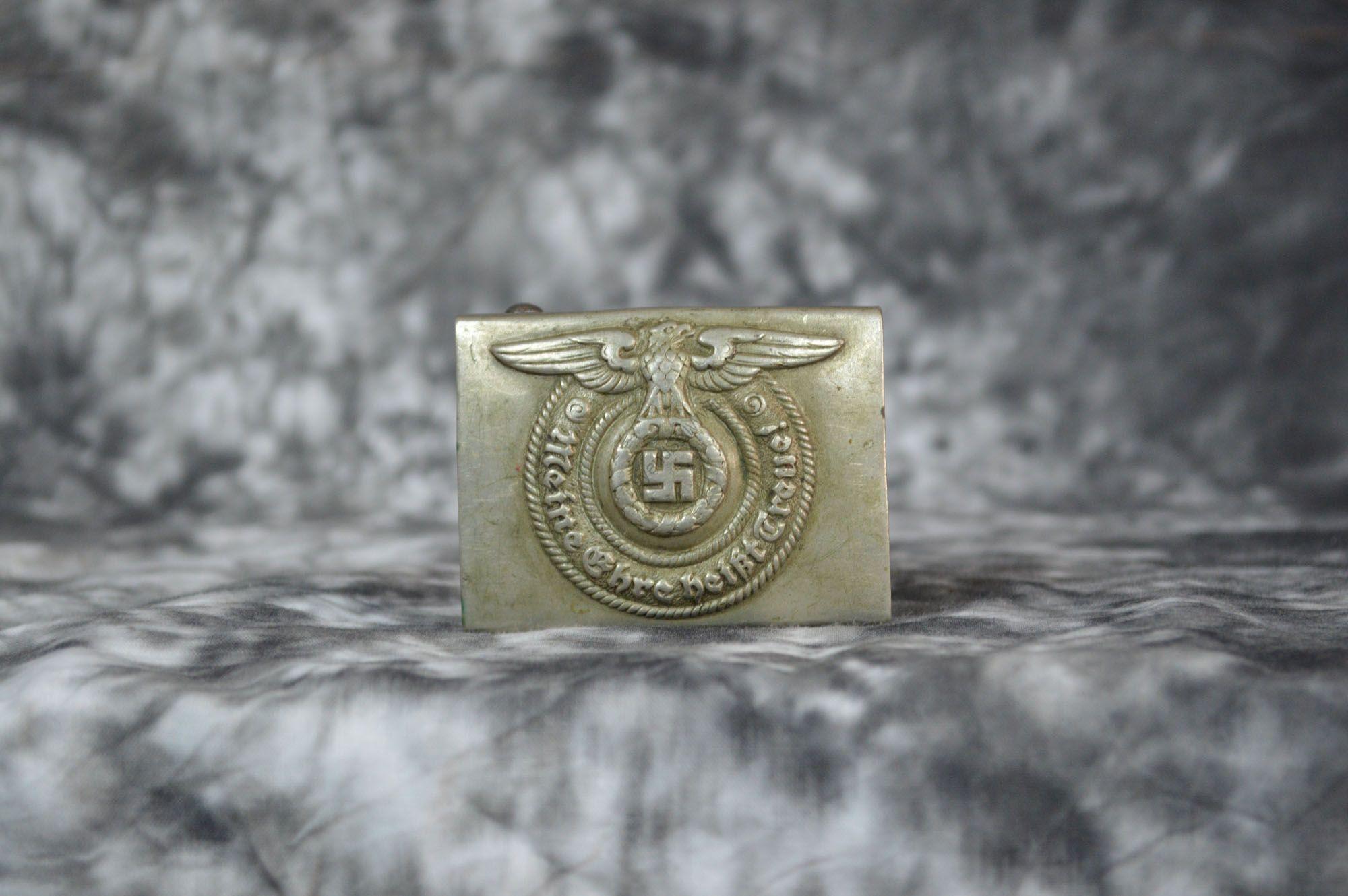 WW2 SS German buckle — group view showing construction detail